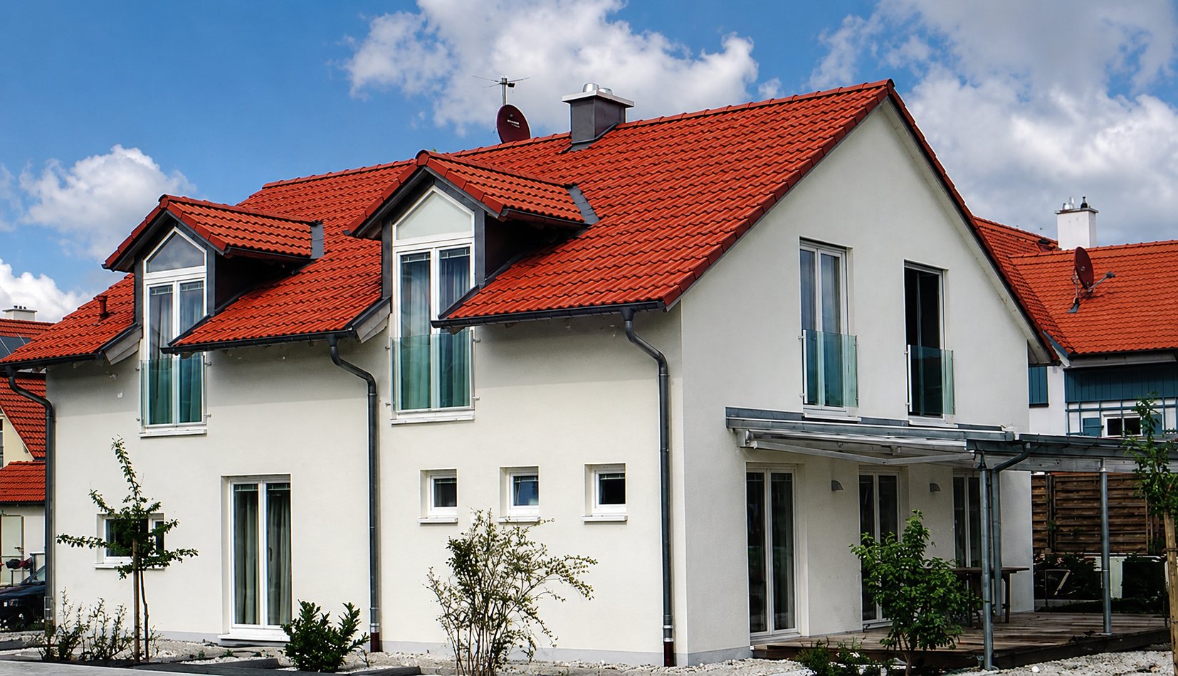 Einfamilienhaus mit rotem Ziegeldach – eigene Ausführung